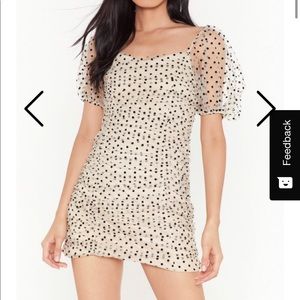 Beige and black polka dot mini dress